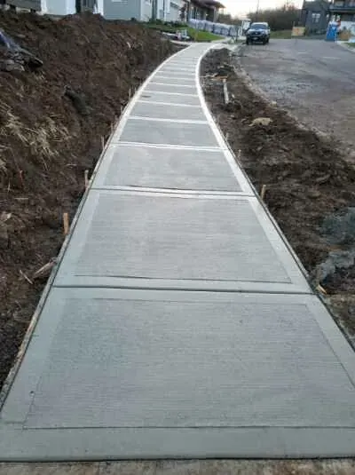 Brush Finish Concrete project by Western Paver Design — photo 4