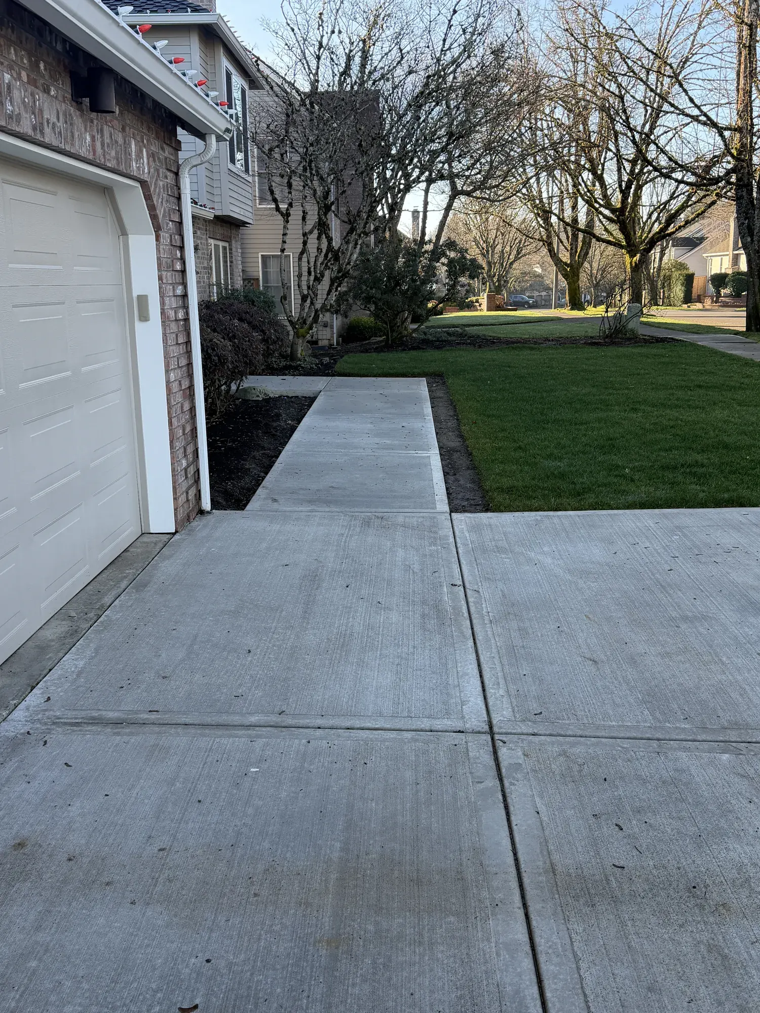 Brush Finish Concrete project by Western Paver Design — photo 1