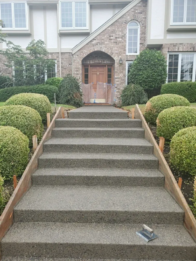 Exposed Aggregate Concrete project by Western Paver Design