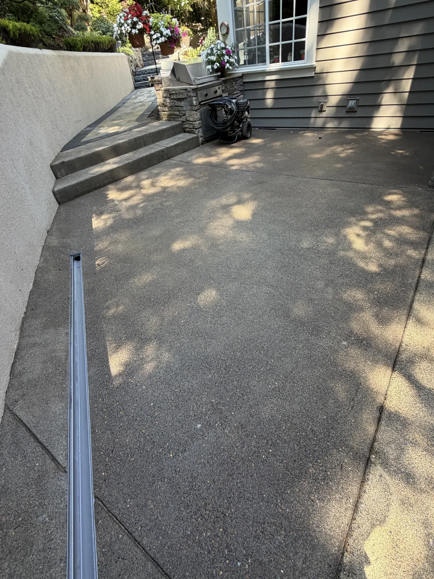 Exposed Aggregate Concrete project by Western Paver Design — photo 2